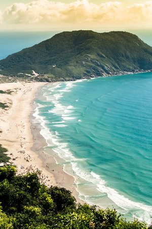 119355265-top-view-of-santinho-beach-taken-from-morro-das-aranhas-florianopolis-santa-catarina-brazil